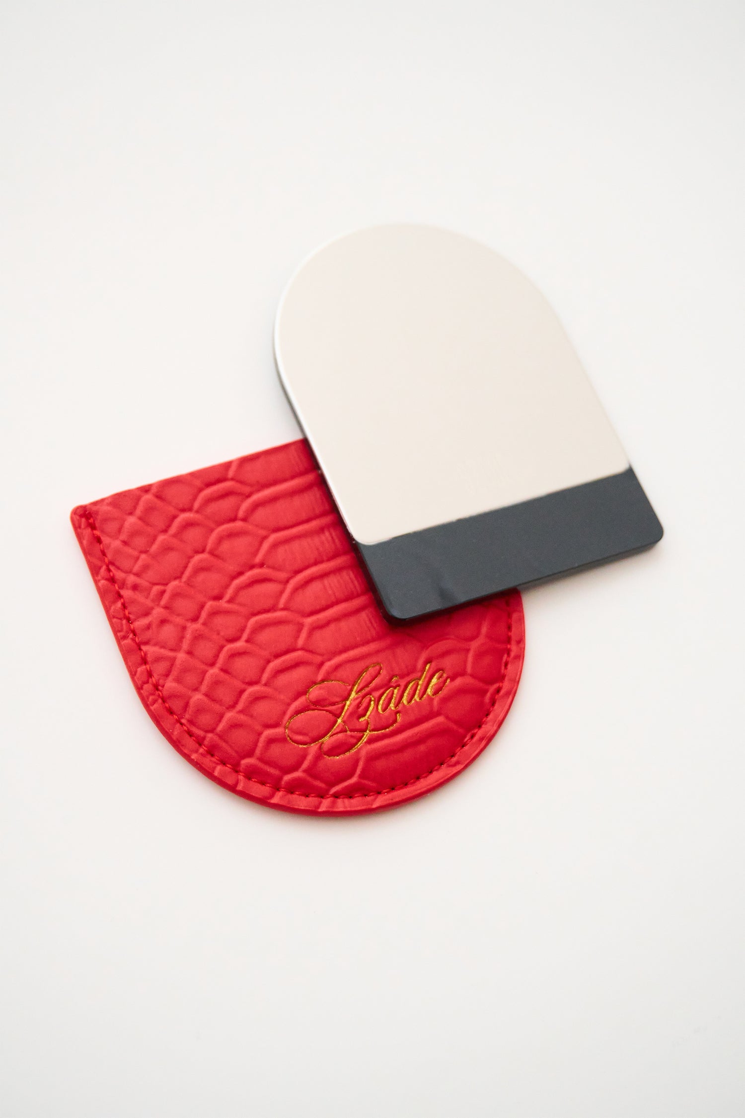 SZADE - the compact ; red snake skin