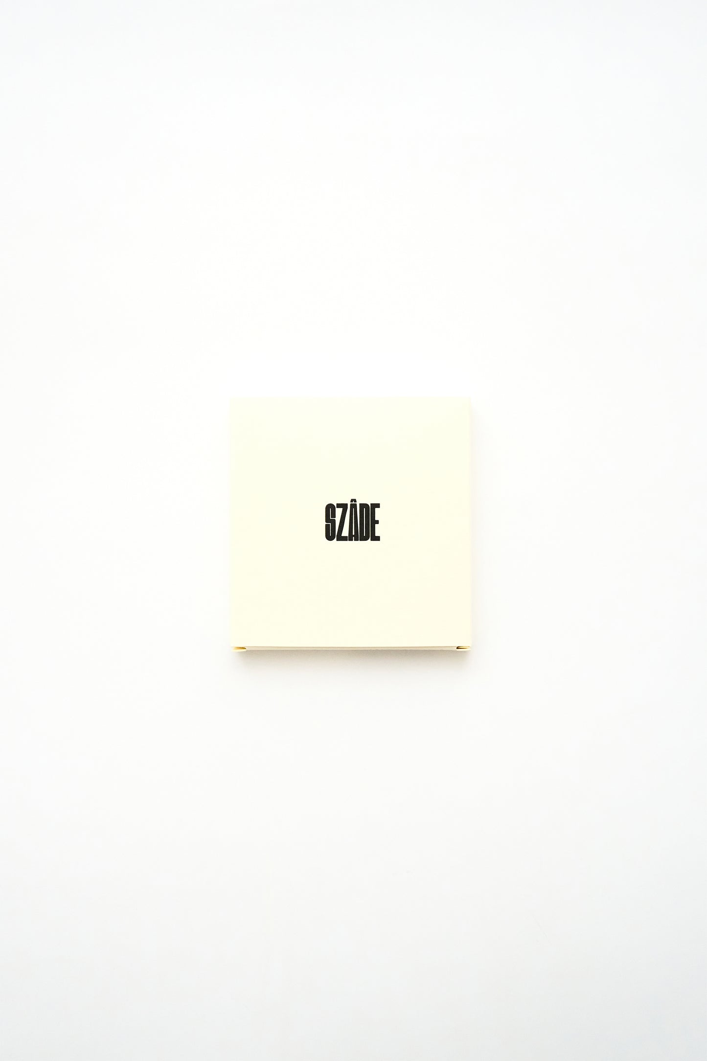 SZADE - the compact ; red snake skin