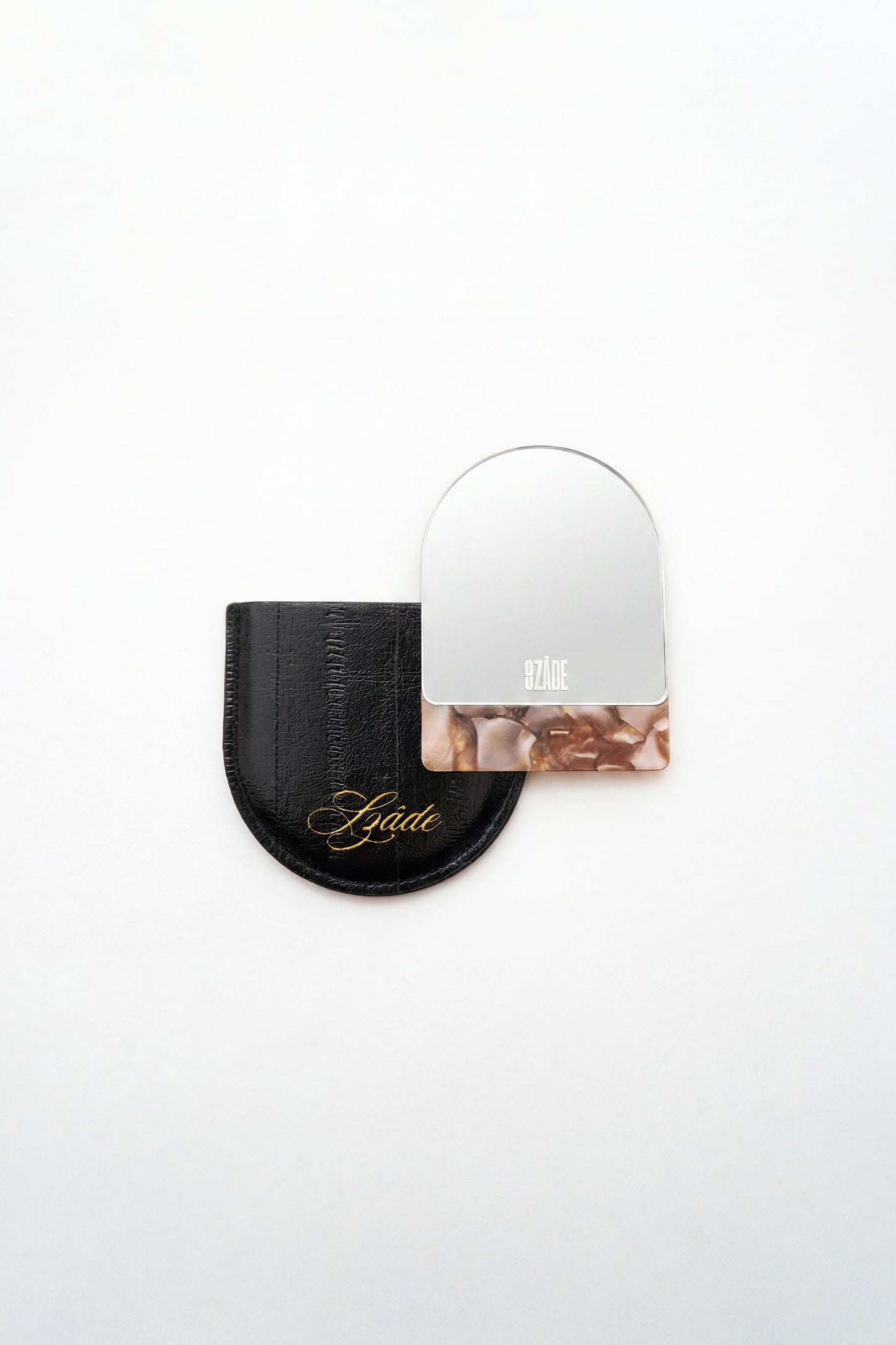 SZADE - the compact ; black eel