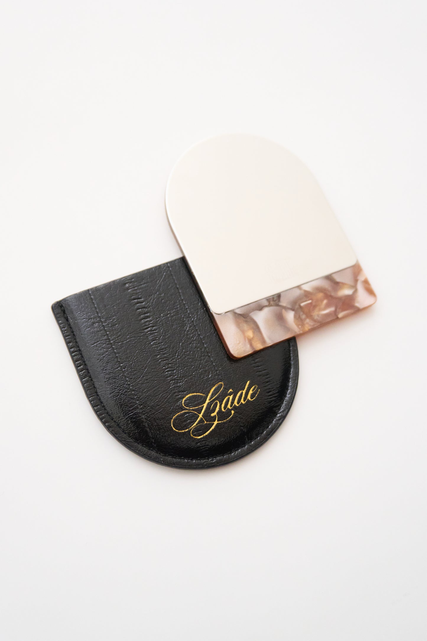 SZADE - the compact ; black eel